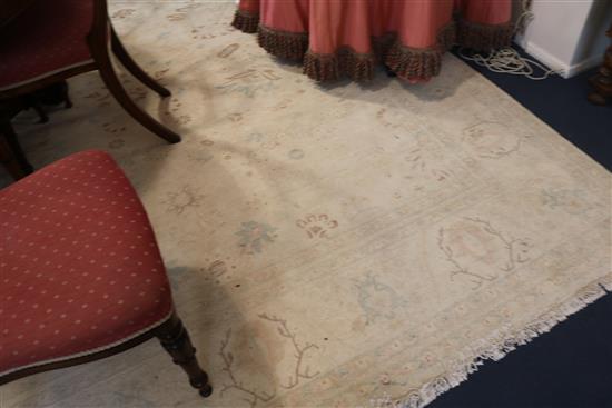 A Pakistan cream ground carpet, 310cm x 250cm